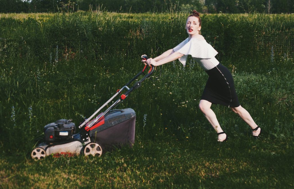 Fashion Woman with lawn mower