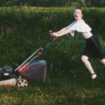 Fashion Woman with lawn mower